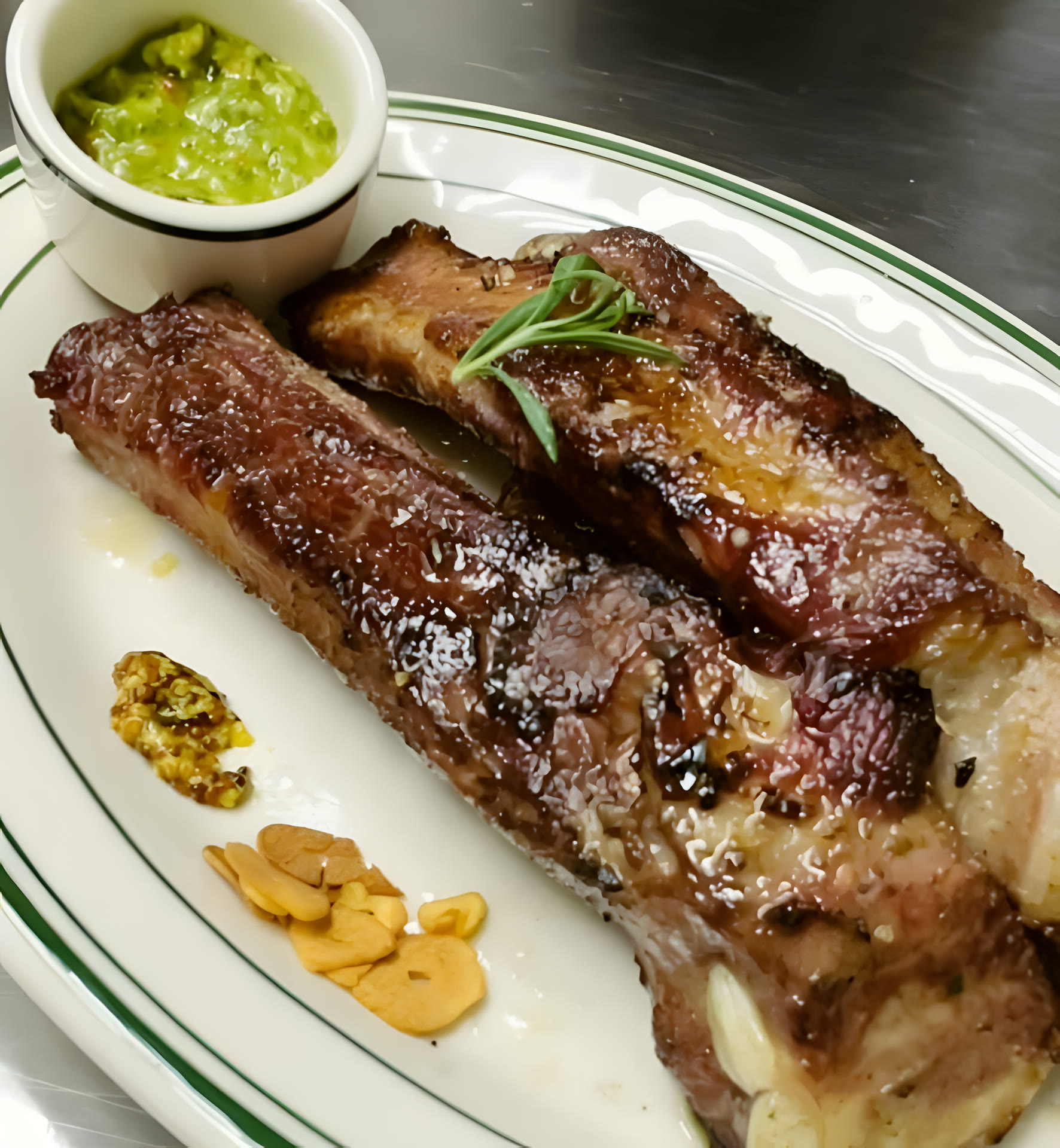 Charcoal-grilled Iberico pork spare ribs, glossy and charred at the edges